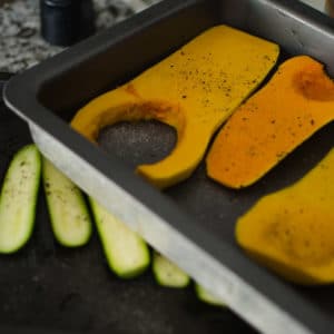 baking trays with the squash and zucchini