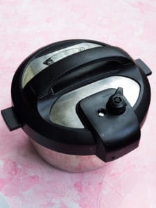 The inner pot of the Instant Pot with the lid on