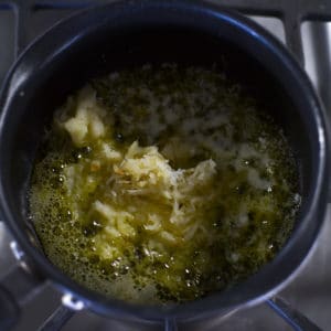 Garlic Butter Popcorn-garlic through the garlic press