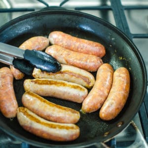 Close up shot browned sausages. Jambalaya Recipe from garlicdelight.com.