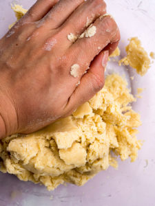 Hand kneading the pâte brisée dough