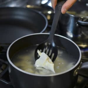 gently place the wontons in the boiling water.