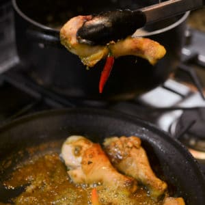 Transfer the chicken to the large pot with the coconut cream